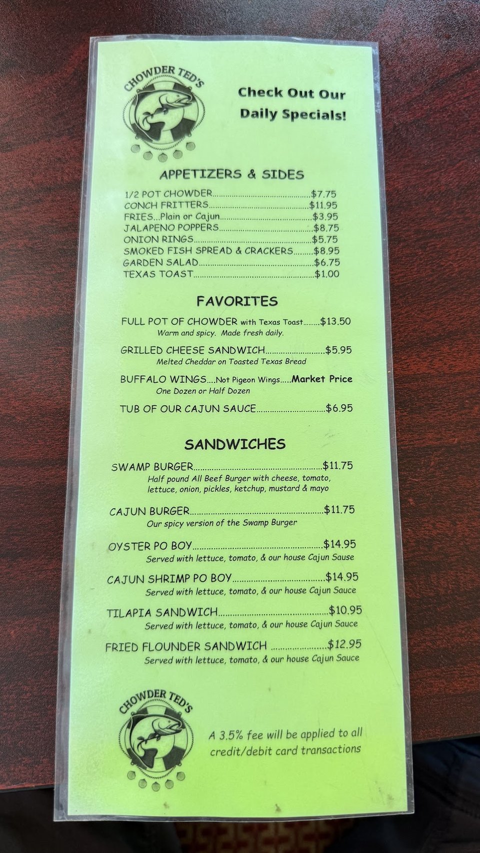 Seafood menu with appetizers and sides.